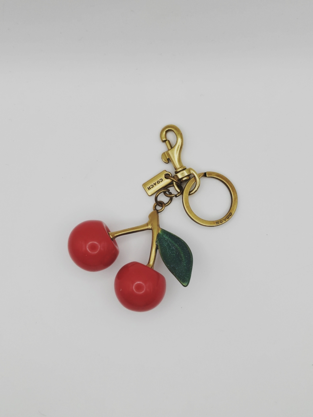 Coach Red Cherry Bag Charm Keychain with Green Leaf and Gold Hardware - Picture 2 of 4